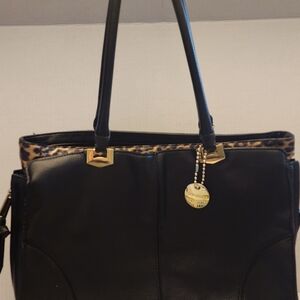Steve madden black and gold leather with Leppard inner lining purse large